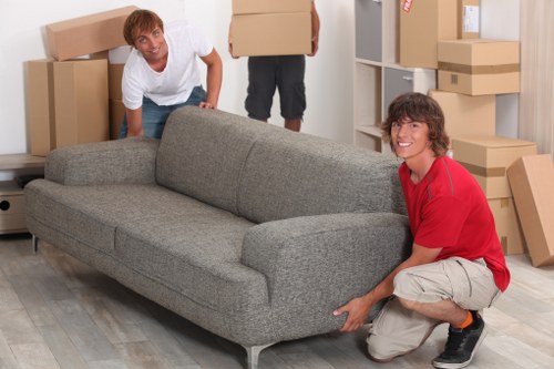 Household moving boxes loaded for truck hire in Greenford