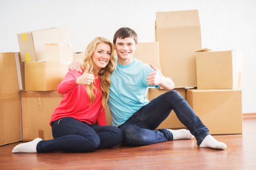 Commercial removals setup with office furniture and equipment